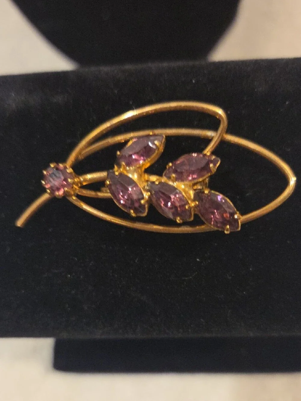 Gold-Tone Leaf Brooch with Purple Marquise Stones
